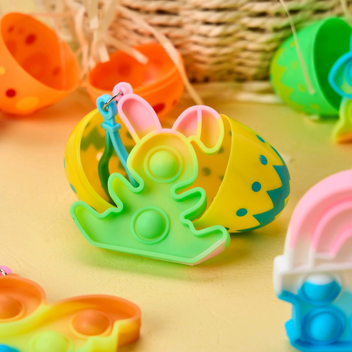 24 Prefilled Printed Easter Eggs with Pop Keychain Fidgets for Egg Hunt